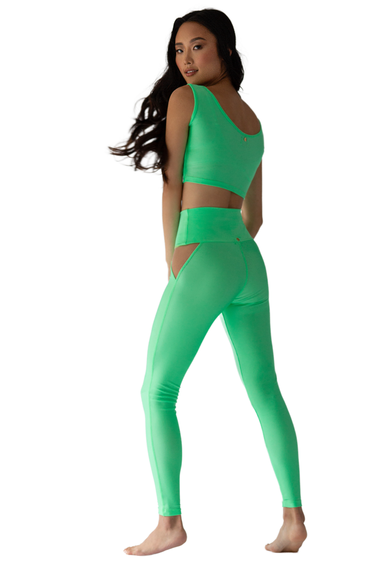 green activewear sports top u shaped neckline. high waist legging w/ mesh cutouts